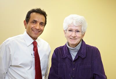 Dr. Rahimi fibromyalgia specialist assisting a client